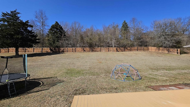 view of yard featuring a trampoline