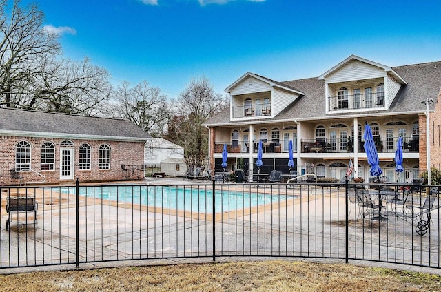 view of swimming pool with a patio area