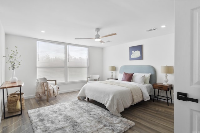 bedroom featuring ceiling fan and hardwood / wood-style floors