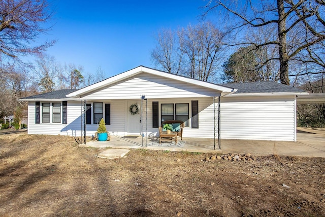 single story home featuring a porch