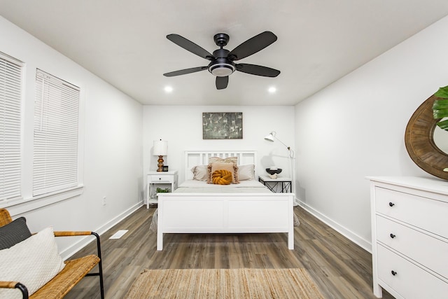 bedroom featuring dark wood-type flooring and ceiling fan