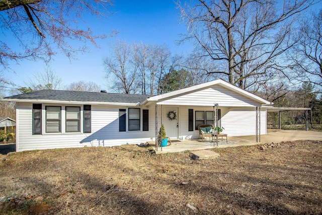 single story home with a carport