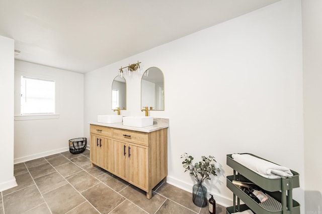 bathroom featuring vanity and tile patterned flooring