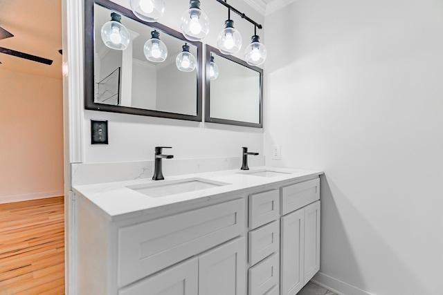 bathroom with vanity and hardwood / wood-style floors