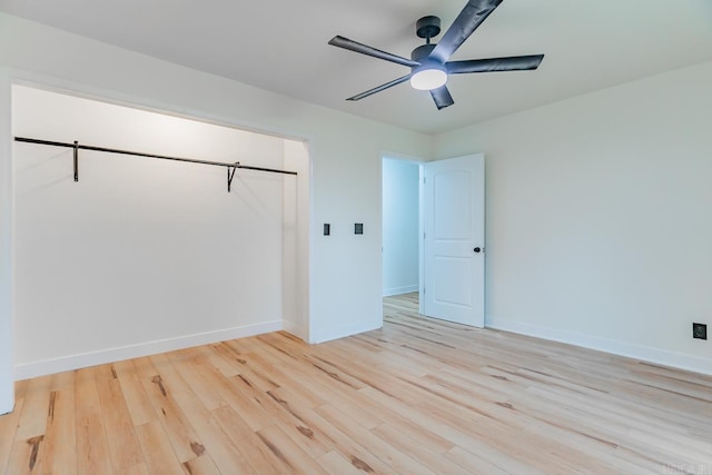 unfurnished bedroom with ceiling fan, a closet, and light hardwood / wood-style flooring