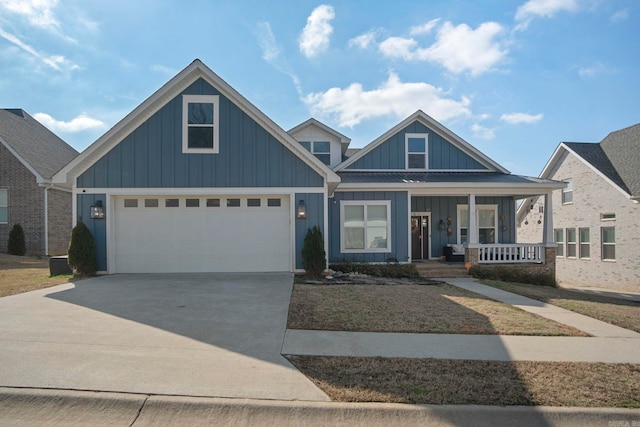 view of front of house featuring a garage and covered porch