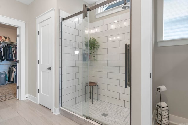 bathroom with an enclosed shower