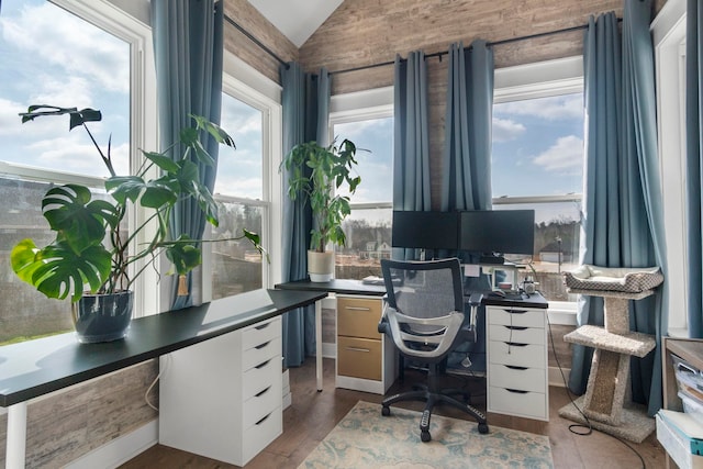 office area featuring hardwood / wood-style flooring and lofted ceiling