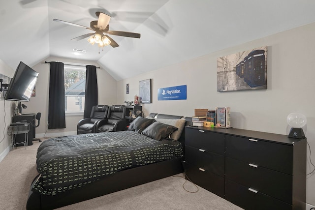 carpeted bedroom featuring lofted ceiling and ceiling fan