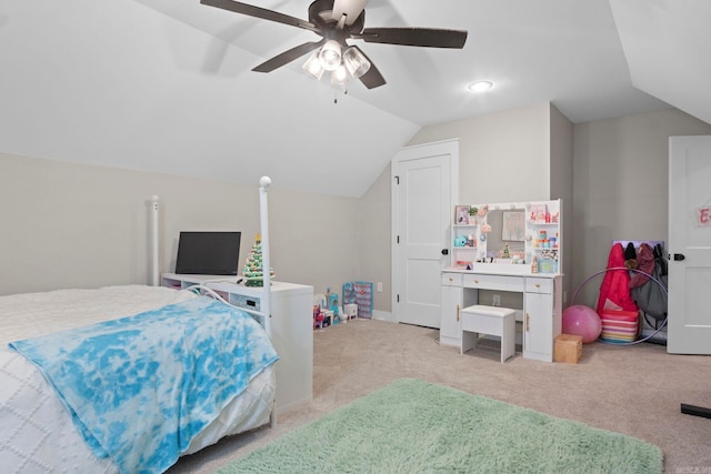 carpeted bedroom featuring ceiling fan and lofted ceiling