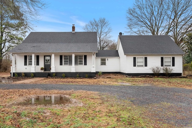 193 Jones Rd, Ward, AR 72176 - view of front of home featuring a shingled roof and a chimney