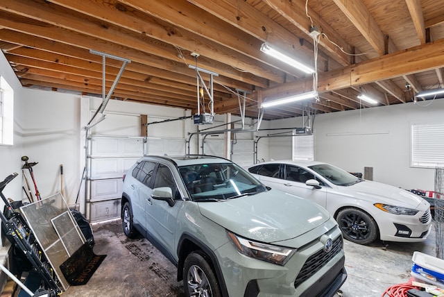 garage featuring a garage door opener