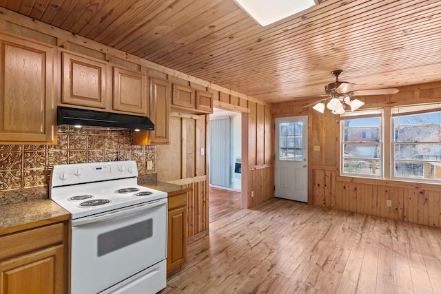 kitchen featuring white electric range, wood walls, backsplash, wooden ceiling, and light wood-type flooring