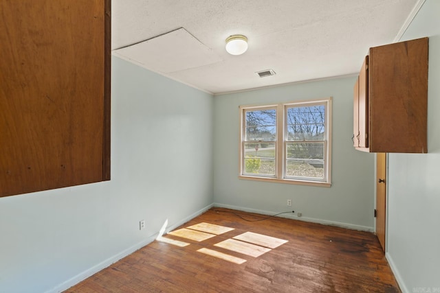 unfurnished room featuring dark hardwood / wood-style floors