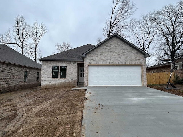 view of front of property with a garage