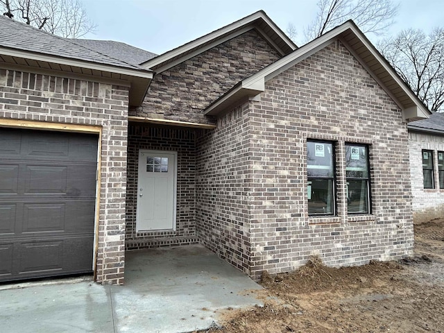 entrance to property with a garage