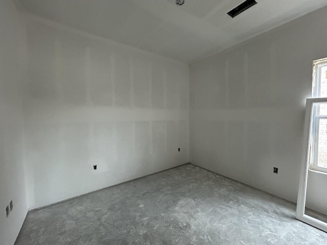 empty room featuring concrete floors