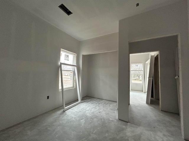 empty room featuring concrete flooring