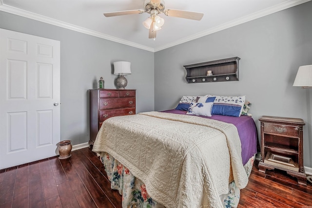 bedroom with dark hardwood / wood-style flooring, crown molding, and ceiling fan