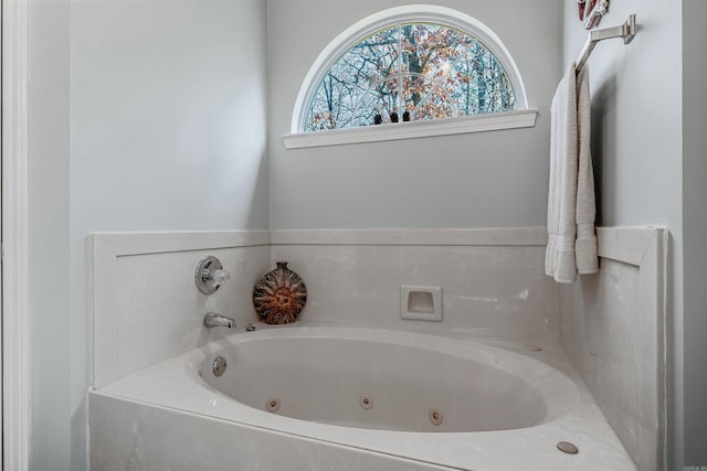 bathroom featuring a tub