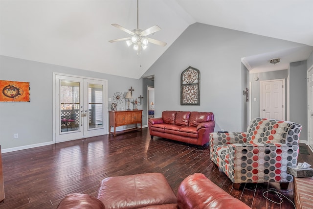 living room with dark hardwood / wood-style flooring, high vaulted ceiling, and french doors