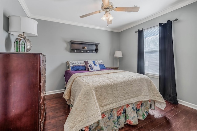 bedroom featuring dark wood-type flooring, ornamental molding, and ceiling fan