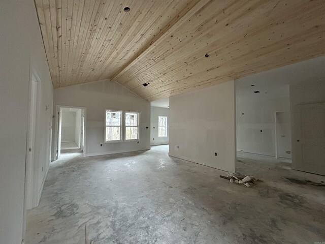 spare room featuring high vaulted ceiling and wooden ceiling