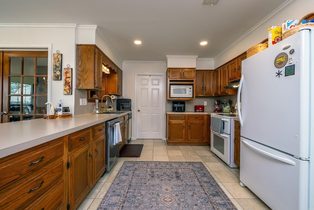 kitchen featuring crown molding, sink, light tile patterned flooring, and white appliances