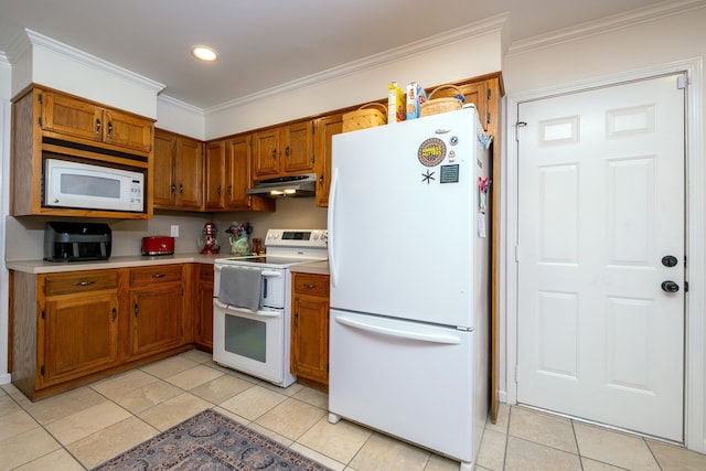 kitchen with white appliances, ornamental molding, and light tile patterned floors