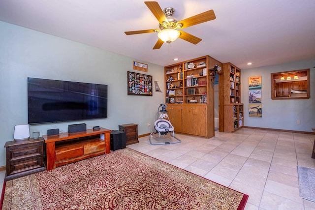 tiled living room with ceiling fan