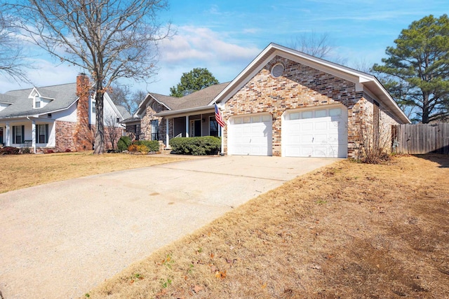 view of front facade with a garage and a front yard