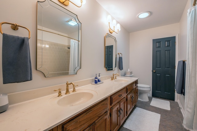 bathroom featuring vanity, curtained shower, tile patterned floors, and toilet