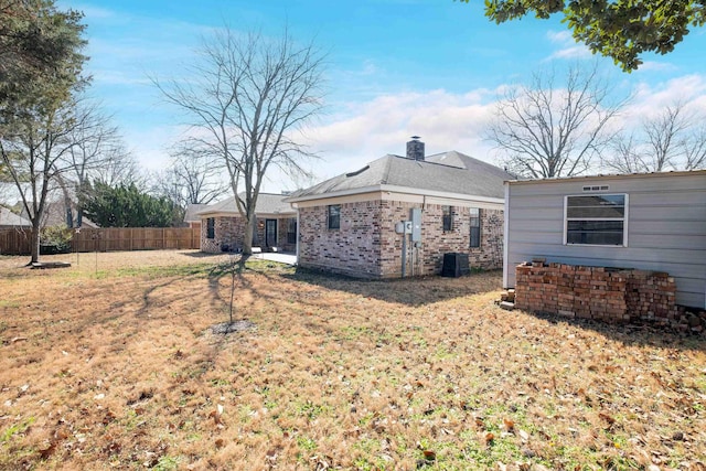 view of home's exterior with a yard