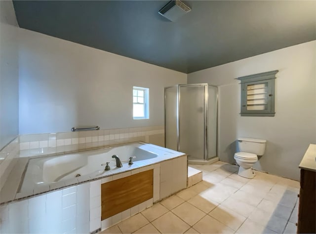 bathroom featuring tile patterned flooring, plus walk in shower, and toilet