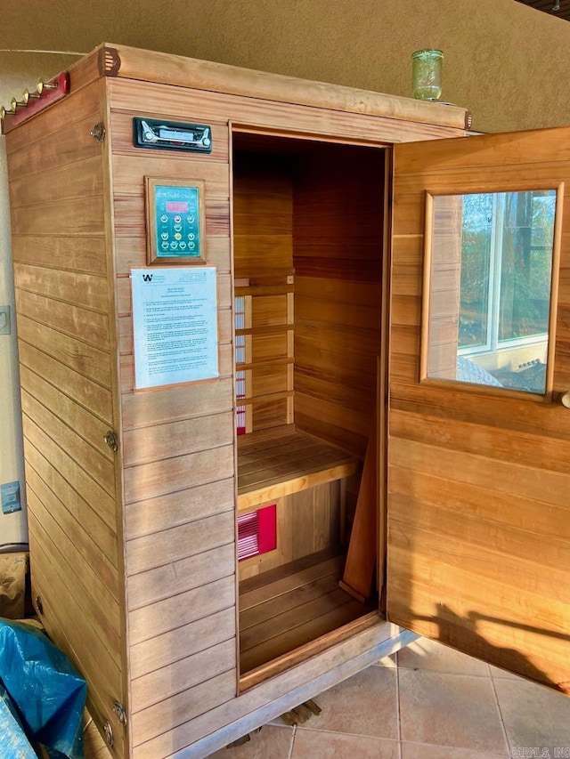 view of sauna / steam room with tile patterned flooring