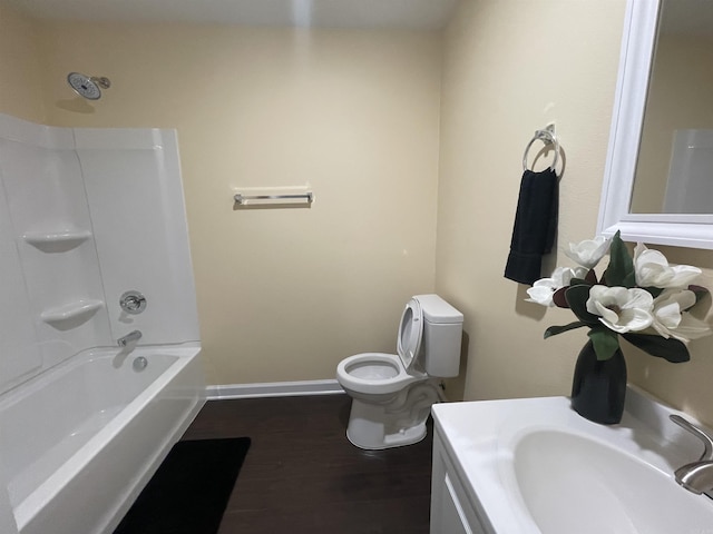 full bathroom with shower / bathtub combination, vanity, toilet, and wood-type flooring