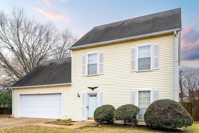 view of front of home with a garage