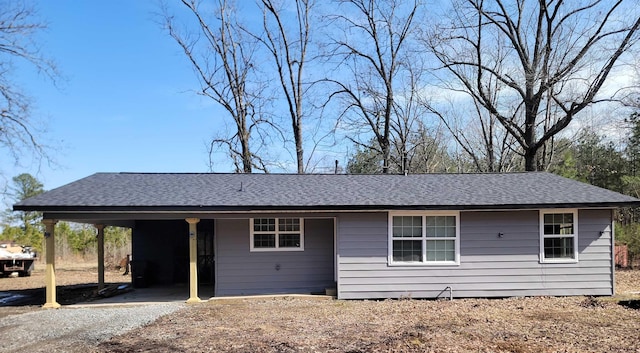 single story home with a carport