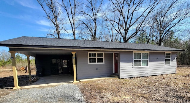 single story home with a carport