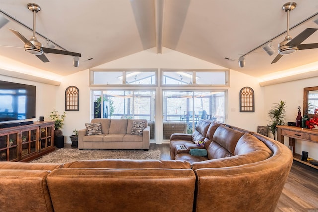 living room featuring lofted ceiling with beams, a wealth of natural light, and ceiling fan