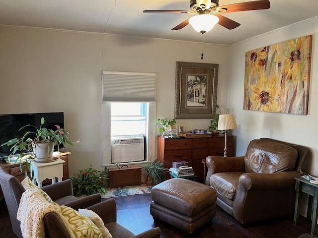 living room featuring crown molding, dark hardwood / wood-style flooring, cooling unit, and ceiling fan