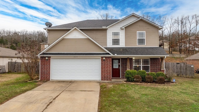 front facade with a garage and a front lawn