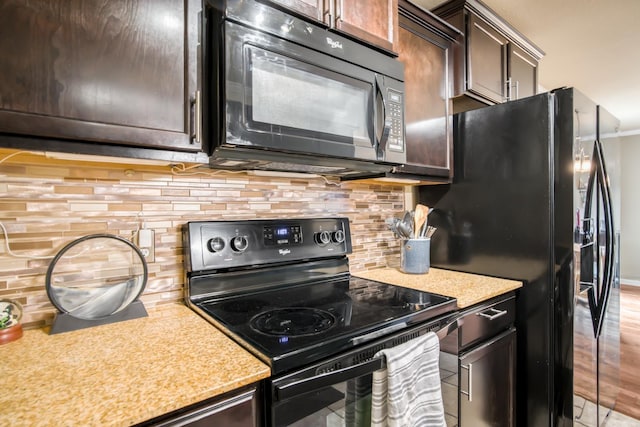 kitchen with dark brown cabinets, backsplash, and black appliances