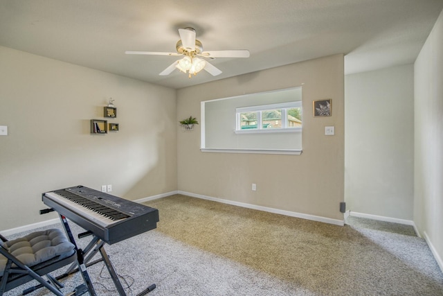 interior space with carpet floors and ceiling fan