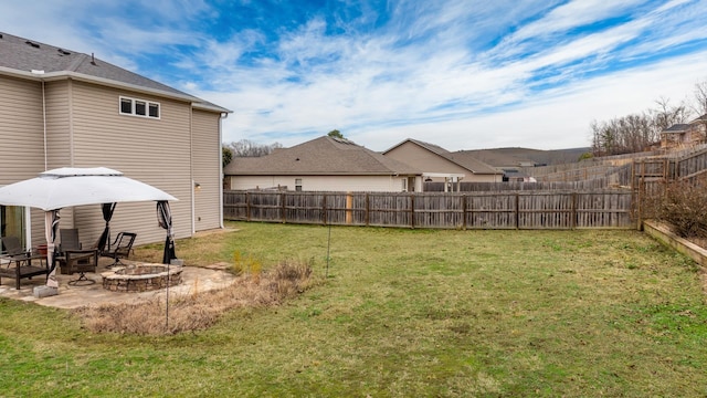 view of yard featuring a gazebo, a patio, and a fire pit