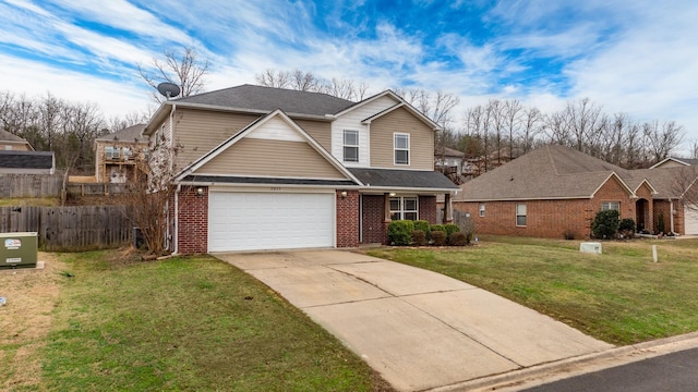 view of front property featuring a garage and a front lawn