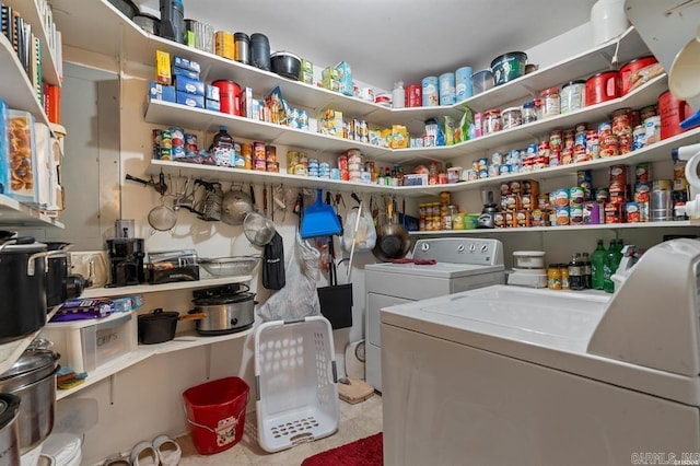 laundry room with washer and clothes dryer