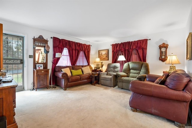 carpeted living room with a healthy amount of sunlight