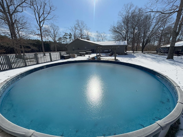 view of snow covered pool