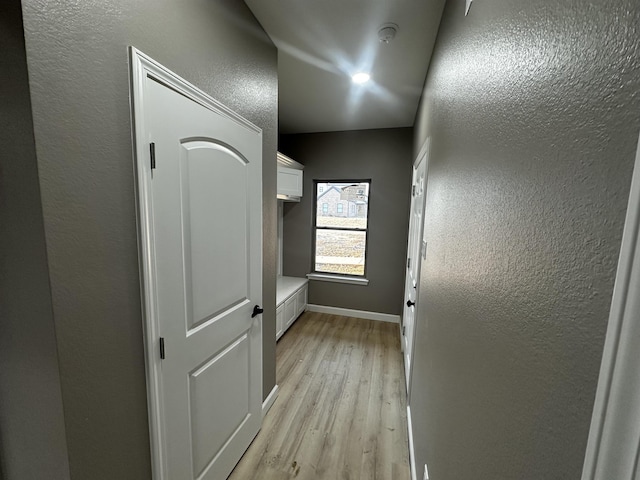 hall featuring light hardwood / wood-style flooring